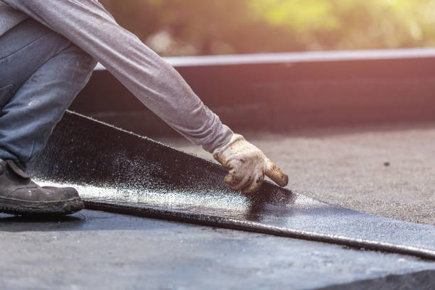 Professional Basement Waterproofing technician working in Mound, MN